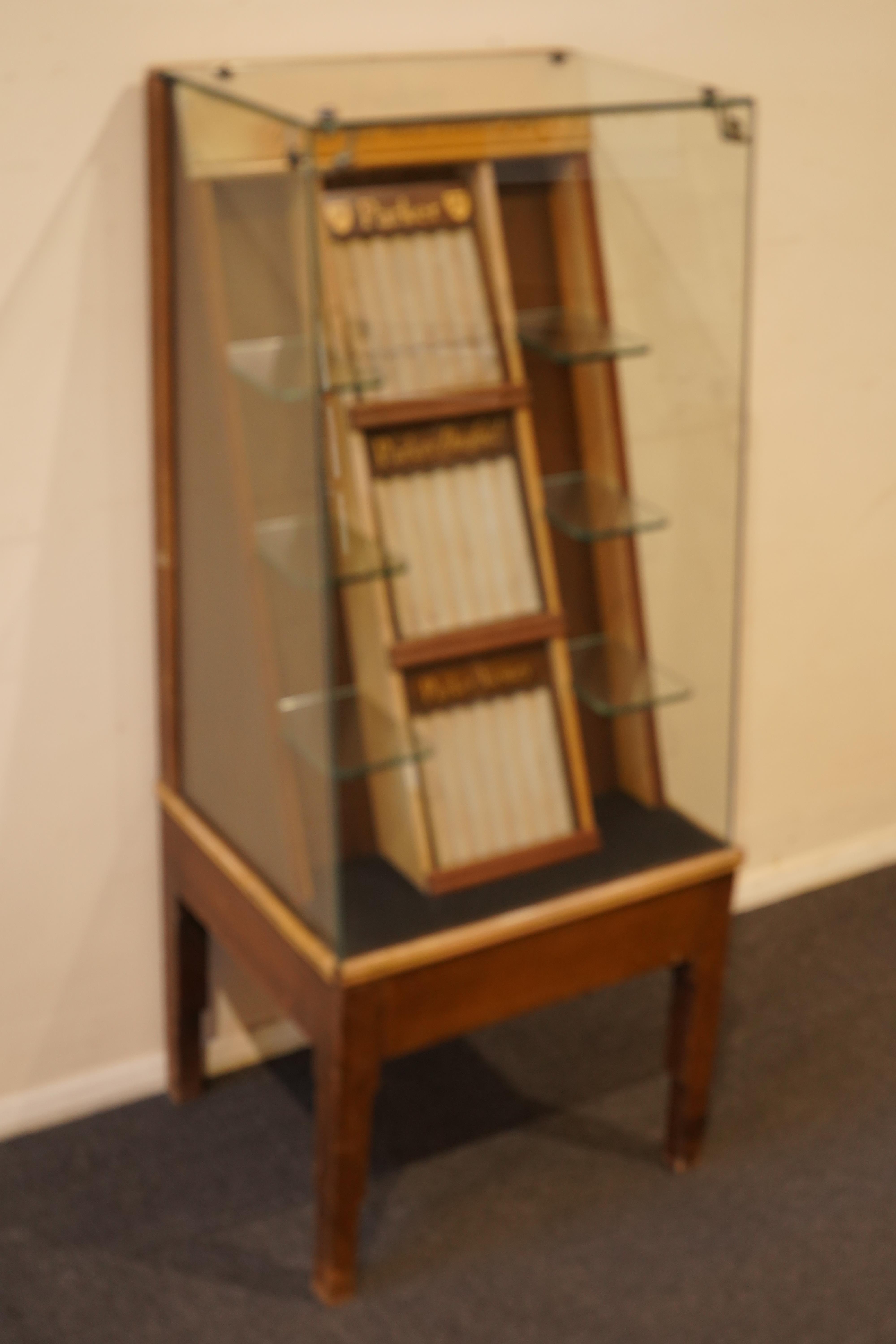 A very rare Parker Shop display cabinet, floor mounted c.1940's, with three trays and glass shelves for Parker '51's', 'Dufolds' and 'Victory's'